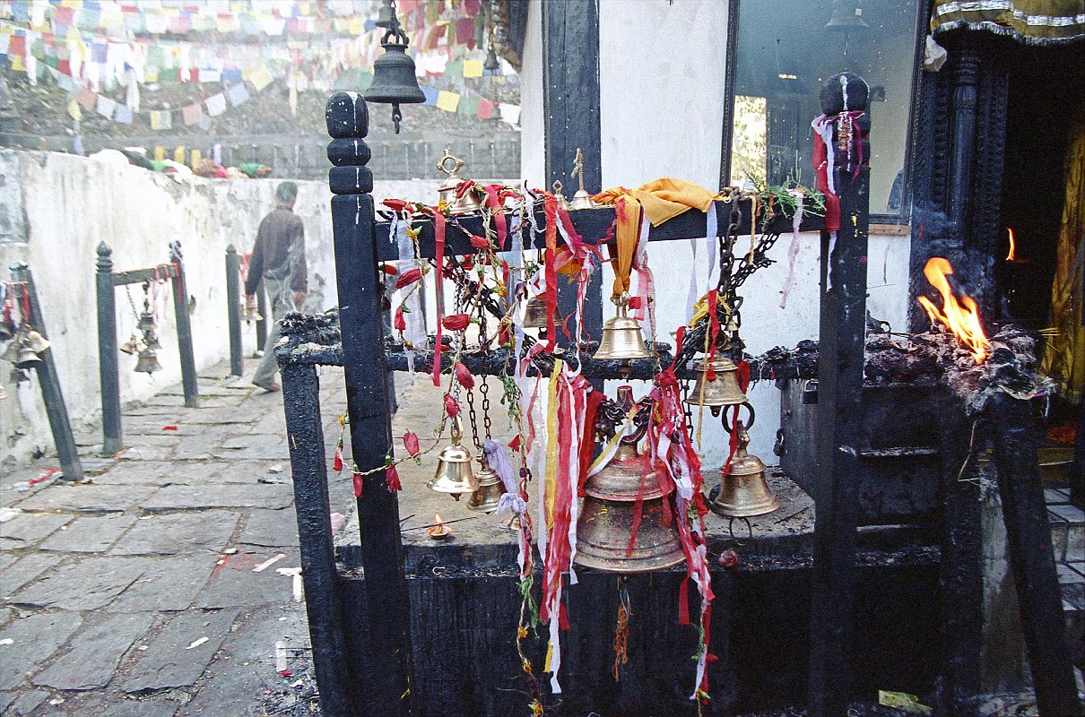 408 Muktinath Chumig Gyatsa Bells and Candles Next To Temple Entrance